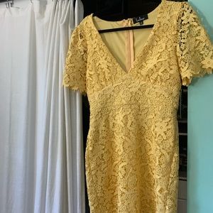 Super cute mid length yellow v-neck dress!